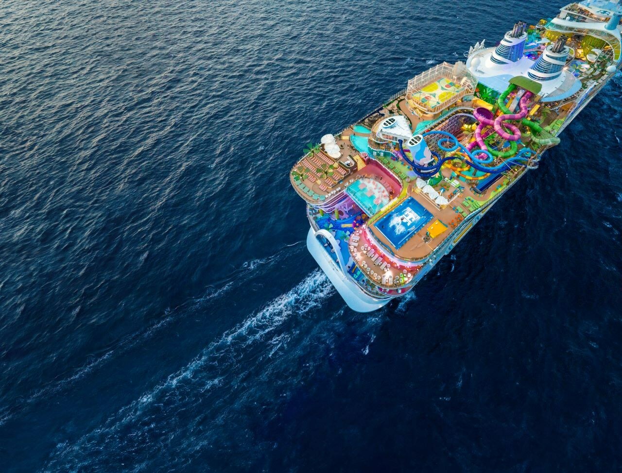 Overhead looking down on a Royal Caribbean cruise ship sailing the ocean